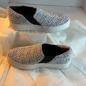 Vince Black and White Slip-On Sneakers